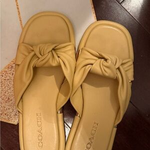 Coach Knot Slide Sandals in Mustard Yellow